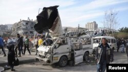 A general view of the destruction after an explosion in central Damascus, Feb. 21, 2013.
