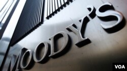A Moody's sign on the 7 World Trade Center tower is photographed in New York August 2, 2011. Behind all too many of market moves in government debt of late has been a report from one of the major credit ratings agencies. Standard & Poor's is the biggest