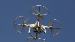 FILE - The use of drones "will help us to define the boundaries of plots of land on the ground with great accuracy," said Samuel Msaki of Tanzania's Ministry of Lands, Housing and Human Settlements Development.