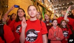 Scouts celebrate the introduction of Scouts BSA at the Party in the Redd Woods even, Feb. 1, 2019, in Portland, Oregon.