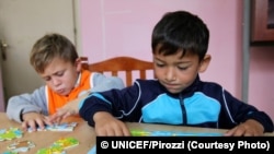 October 2016, Tirana the capital. Children from the ROMA community in art class assisted by educators. The House of colours centre closely cooperates with all relevant state authorities, including the police, State Social Services, Child Protection Unit