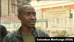 Adrian Manjere has an arm which was fractured by a stray bullet from an AK-47 on August 1, according to a medical report. He says he's spent about $11,000 for medical treatment.