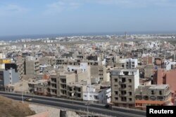 A cityscape of Dakar is seen from the top of African Renaissance hill, Senegal, Dec. 19, 2016.