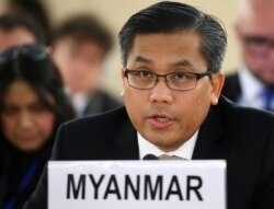 FILE PHOTO: Myanmar's ambassador Kyaw Moe Tun addresses the Human Rights Council at the United Nations in Geneva, Switzerland, March 11, 2019. REUTERS/Denis Balibouse/File Photo