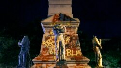 Spomenik snagama Konfederacije ispisan je grafitima a statue oborene posle protesta u Portsmutu u Virdžiniji, 10. juna 2020.