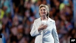 Democratic presidential nominee Hillary Clinton takes the stage to give her acceptance speech during the final day of the Democratic National Convention in Philadelphia, Thursday, July 28, 2016. (AP Photo/Paul Sancya)