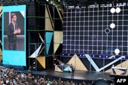 FILE - Google chief executive Sundar Pichai outlines a future rich with artificial intelligence at the Internet firm's annual developers gathering in the Silicon Valley city of Mountain View, California, May 18, 2016. Citing national security concerns, the Pentagon and some lawmakers scrutinize foreign investors backing U.S. artificial intelligence, robotics and other key technology projects.