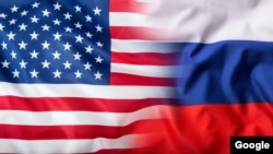 Kombinacija preklapajućih nacionalnih zastava Sjedinjenih Država i Rusije