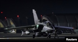 An RAF Tornado taxis to the threshold before taking-off, in Akrotiri, Cyprus, April 14, 2018. (© UK MOD Crown 2018/Handout via Reuters)