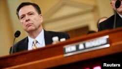 FILE: On March 20, 2017, in Washington, FBI Director James Comey testifies before the House Intelligence Committee hearing into alleged Russian meddling in the 2016 U.S. election.
