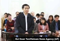 FILE - Vietnam's prominent blogger Nguyen Huu Vinh, shown on trial in Hanoi, Vietnam, was sentenced to five years in prison for posting anti-state writings, March 23, 2016. Human rights will be on the agenda during U.S. President Barack Obama's visit to Vietnam next week.