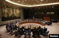 The United Nations Security Council votes to approve a resolution at the U.N. headquarters in New York, July 20, 2015.
