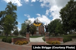One of the entrances to DePauw University, decorated in the school's colors.