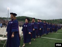 Liberty University graduates file to the school's commencement ceremony, in Lynchburg, Virginia, May 13, 2017. (C. Presutti/VOA)