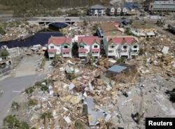 An aerial photo shows damaged and destroyed homes after Hurricane Michael smashed into Florida's northwest coast in Mexico Beach, Oct. 12, 2018.