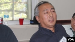 资料照片：时任民运团体民主中国阵线副主席的唐元隽在纽约参加一次讨论中国政局的研讨会。 (2015年9月19日)。