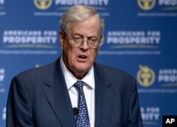 FILE - David Koch speaks in Orlando, Florida, Aug. 30, 2013.