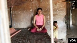 Chhim Chhaiya, 32, is a garment worker at a factory in Bavet city, Svay Rieng province, Cambodia, June 17, 2017 (Sun Narin/VOA)