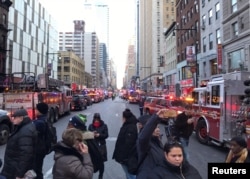 Police and fire crews block off the streets near the New York Port Authority in New York City, U.S. Dec. 11, 2017 after reports of an explosion.