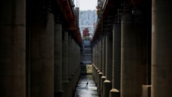 A man enjoys wakeboarding underneath a bridge amid the coronavirus disease (COVID-19) pandemic at Han river in Seoul, South Korea, June 2, 2021.