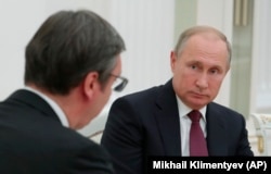 Predsednik Rusije Vladimir Putin u razgovoru sa predsednikom Srbije Aleksandrom Vučićem u Moskvi, 2. oktobra 2018.