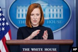 FILE - White House press secretary Jen Psaki speaks during a press briefing at the White House, Dec. 22, 2021, in Washington.