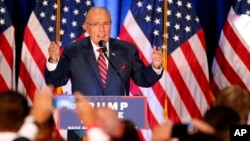 FILE - Former New York Mayor Rudy Giuliani speaks before Republican Presidential candidate Donald Trump in Youngstown, Ohio, Aug. 15, 2016.