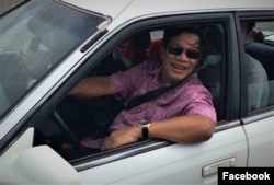 This recent Facebook photo shows Hun Sen at the wheel of a passenger vehicle. Usually, he's driven in a bulletproof SUV.
