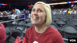 Carlee Daub of Norman, Oklahoma, is thrilled at the prospect of watching her Oklahoma Sooners play in the Final Four, and she has a special connection to the team: She's married to one of the coaches. (G. Flakus/VOA)