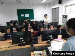 Tes Putthira, technical mentor for coding for train the “Cambodia Identity Product” girls team from the Liger Learning Center during a 12-weekend training at the Cambodia-Korea Cooperation Center. (Courtesy of Technovation Cambodia)