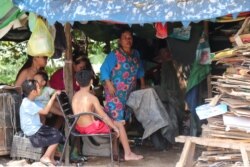 49-year old Phin Mom has been supporting her family by working as a trash collector for over eight years in Phnom Penh, Cambodia, April 22, 2020. (Phorn Bopha/VOA Khmer)
