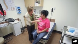 Une patiente en consultation dans l'Oregon