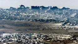 FILE - Dhaulagiri, seventh-highest peak in the world at 26,794 ft (8,167 m) dominates the skyline in this image taken by the Expedition 1 crew from the International Space Station using a high-magnification lens.