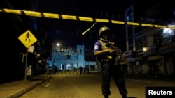 Security forces stand guard at St. Antony shrine, days after a string of suicide bomb attacks on churches and luxury hotels across the island on Easter Sunday, in Colombo, Sri Lanka, April 24, 2019.