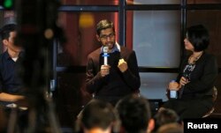FILE - Google CEO Sundar Pichai gestures as he addresses conference with local IT community, Hanoi, Vietnam, Dec. 22, 2015.