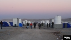 The International Organization for Migration says 84,000 people have fled their homes since the Mosul offensive began in mid-October and new camps, like Hassan Sham's third location, are being built up in anticipation of a possible displaced population of a million. Hassan Sham, Iraqi Kurdistan, Dec. 7, 2016. (H.Murdock/VOA)