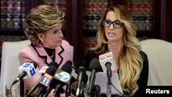 Jessica Drake speaks to reporters about allegations of sexual misconduct against Donald Trump, alongside lawyer Gloria Allred (L) during a news conference in Los Angeles, California, Oct. 22, 2016.