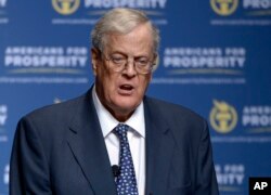 In this Aug. 30, 2013 file photo, David Koch speaks in Orlando, Florida.