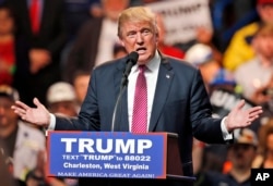 Republican presidential candidate Donald Trump gestures during a rally in Charleston, West Virginia, May 5, 2016.