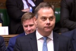 资料照：英国外交国务大臣纳杰尔·亚当斯