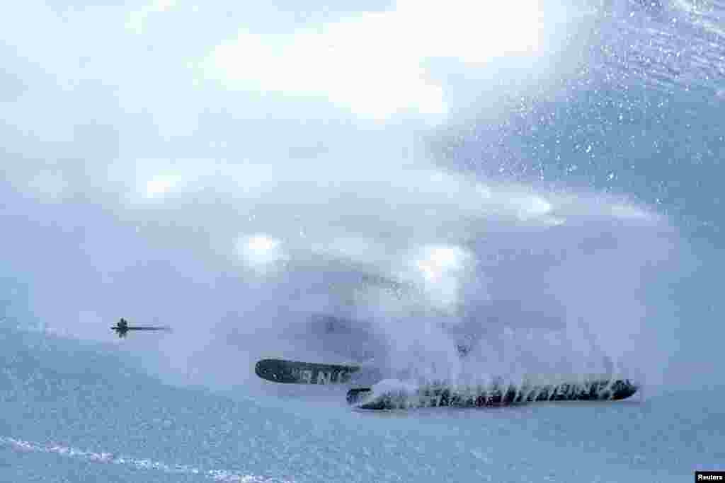 Kuwait's Salman Alkandari falls while competing in the men's freeski slopestyle final run during the Harbin 2025 Asian Winter Games at Freeski Aerials Stadium, Yabuli, China. REUTERS/Hannah Mckay