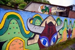 A wall painted by Hakka graffiti artist Wu Tsun-hsien in the Taiwanese village of Ruan Chiao, March 30, 2019.