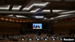 وەزیری دەرەوەی ڕووسیا سێرگەی لاڤرۆڤ لەمیانەی کۆنفرانسی داماڵینی چەکدا لە جنێڤ، 