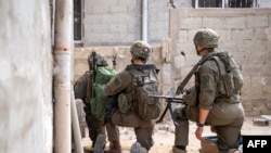 Ushtarët izraelitë gjatë operacionit në Gazë, e publikuar nga ushtria izraelite më 20 qershor, 2024/AFP