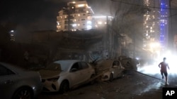 Šteta pričinjena u Tel Avivu posle napada Hamasa (Foto: AP/Moti Milrod)