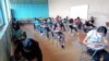 El regreso a clases semipresenciales está bajo revisión en Honduras debido a un repunte de casos de COVID-19. Foto Oscar Ortiz, VOA.
