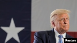 FILE - President Donald Trump delivers a speech in Midland, Texas, July 29, 2020.