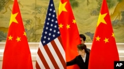 ARHIVA - Pripreme za američko-kineske pregovore u Pekingu, 14. februara 2019. (Foto: AP)