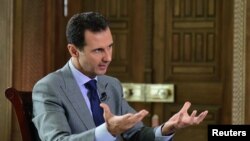 Bachar Al-Assad lors d'une interview télévisée, le 14 octobre 2016 