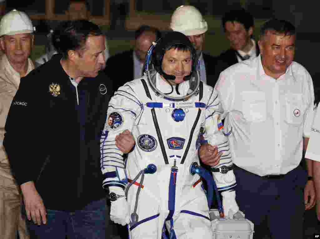 Russian cosmonaut Oleg Kononenko prepares to board the Soyuz TMA-17M rocket a few hours before the launch to the International Space Station, at the Russian leased Baikonur Cosmodrome, in Kazakhstan, July 23, 2015.